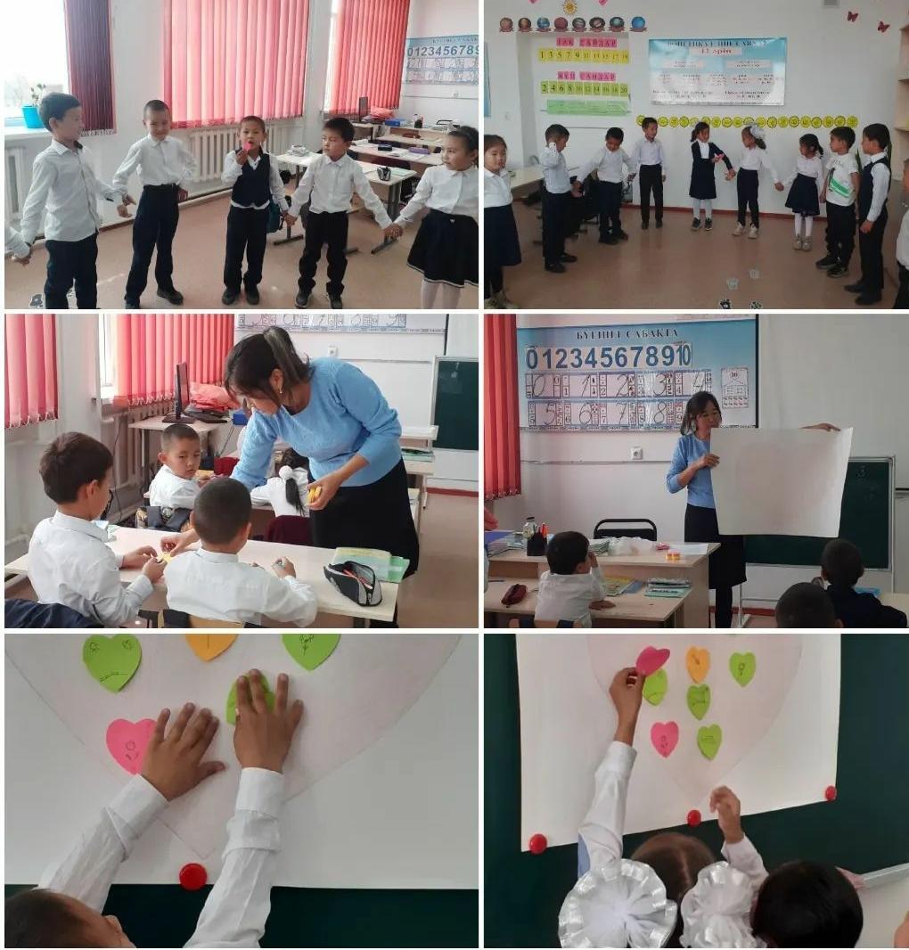 1-сынып оқушыларымен мектеп психологы тренинг жүргізуде