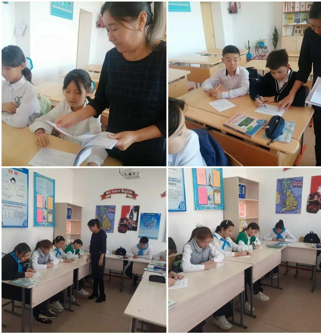 Мектеп психологы 5-сынып оқушылармен тренинг өткізу үстінде